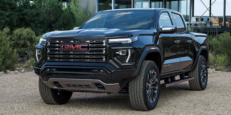 2026 GMC Canyon Denali black pickup truck showcasing exterior design and safety features