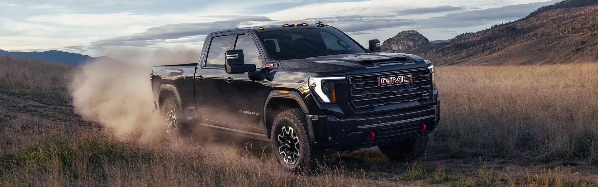 2026 GMC Sierra 2500 HD heavy-duty truck hero image front three-quarter view bold exterior stance