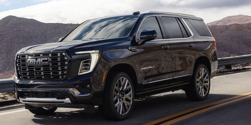 2026 GMC Yukon SUV on scenic road
